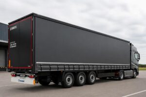 Custom fitted PVC curtainsider installed on a European semi-trailer, showing gap-free alignment with truck body